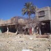 The rubble in front is all that remains of a Palestinian house destroyed by Israelis. Credit: Mel Frykberg