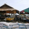 Six weeks after floods reached a record peak in Laos, sandbags still line the roads of Vientiane.  Credit: Soe Win Nyein/IPS