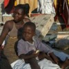 Sandra Alberto (32) held her children to prevent them from being blown away by Cyclone Favio. Credit: UNICEF/Thierry Delvigne-Jean