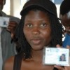 SWAPO supporter Martha Hamukoto and her friends show their new voter's cards. Credit: Servaas Van den Bosch/IPS