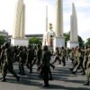Thai soldiers pass the Democracy Monument in Bangkok as they deploy to drive out 'red shirt' protesters. Credit: Marwaan Macan-Markar/IPS