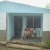 Marilú Figueredo in her house made of ecomaterials in Manicaragua, Cuba. Credit: IPS Cuba.