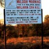 A sign warns of the risk posed by malaria in south-eastern Zimbabwe. (Photo: Don Boroughs) Credit: PictureNET Africa