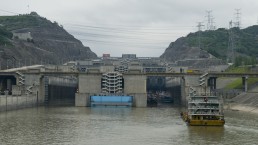 Five-stage locks on China’s Yangtze River are part of the Three Gorges Dam development project. The locks have greatly increased the freight capacity of the river and reduced the transit time. Credit: Trevor Page