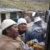 Indigenous women sell food to bus passengers outside La Paz, Bolivia. - Diana Cariboni/IPS