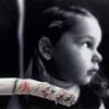 Children often end up as second-hand smokers - Photo Stock