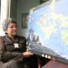 Mary Simon and a map of the Inuit communities. - Courtesy of Inuit organization