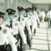 Surgical masks have become part of the Mexican police uniform. - Marcos Ferro Tarasiuk/IPS