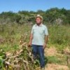 Francisco Soares Oliveira in his field. His maize and bean crops were lost to this year's unusual floods. - Mario Osava/IPS