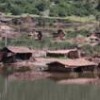 The remains of the Cuzco village of Piñipampa emerge from the water - Roberto Guerrero/Courtesy of Oxfam