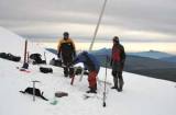 Ecuadorean and French scientists take samples from the Antisana glacier. In the background, to the left, rises Cotopaxi, one of the world's highest active volcanoes. - Courtesy of Bernard Francou/IRD Ecuadorean and French scientists take samples from the Antisana glacier. In the background, to the left, rises Cotopaxi, one of the world's highest active volcanoes. - Courtesy of Bernard Francou/IRD