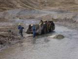 Caudalosa workers clean up mining tailings in the Opamayo River - Milagros Salazar/IPS