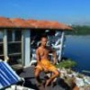Bispo the bricklayer in his floating house. - Renzo Gostoli