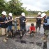 Environmental monitors inspecting an old oil well. - Courtesy of Amazon Indigenous Peoples United in Defense of their Territories